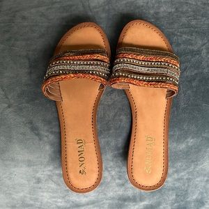 Nomad tan slide sandals, size 9. True to size. Worn once.